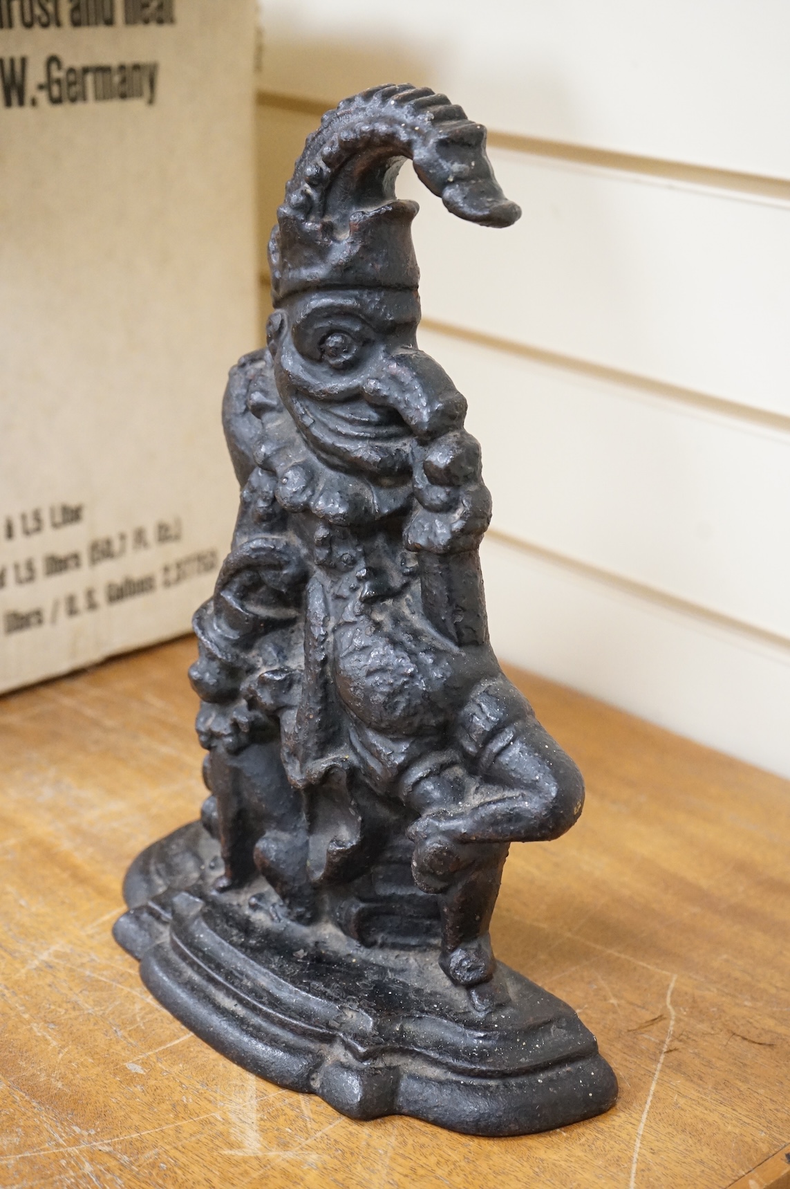 A cast iron Mr Punch door stop, 31cm